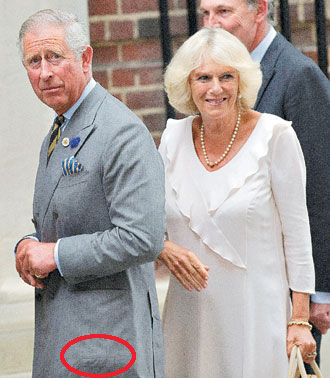 查爾斯王子最近一掃浮華氣派,多次被媒體拍到穿同一件下擺有大塊補丁的灰色西裝外套。歐新社圖